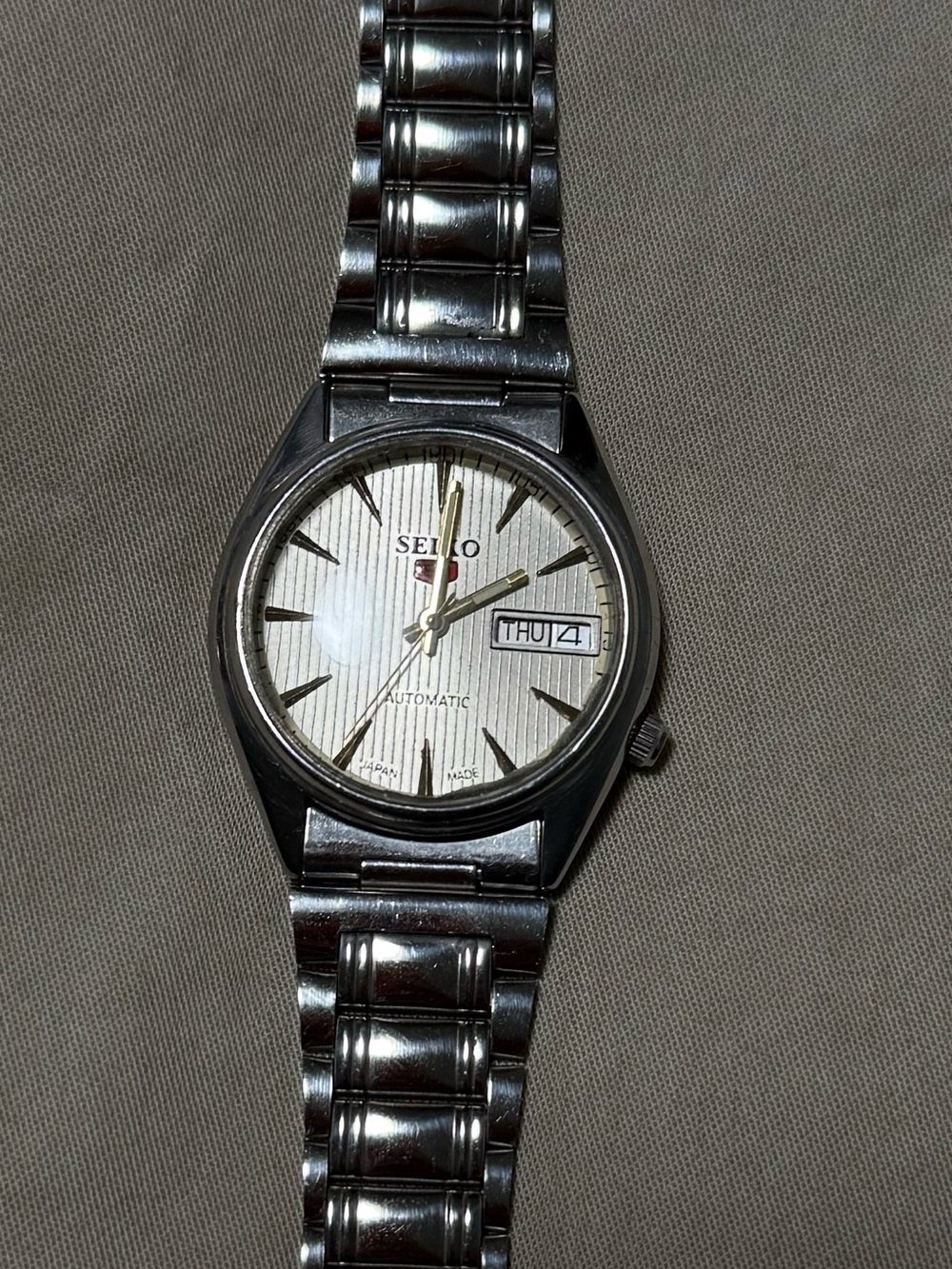 Seiko Silver Stainless Steel Watch with cream Dial and Gold Accents. 36mm.